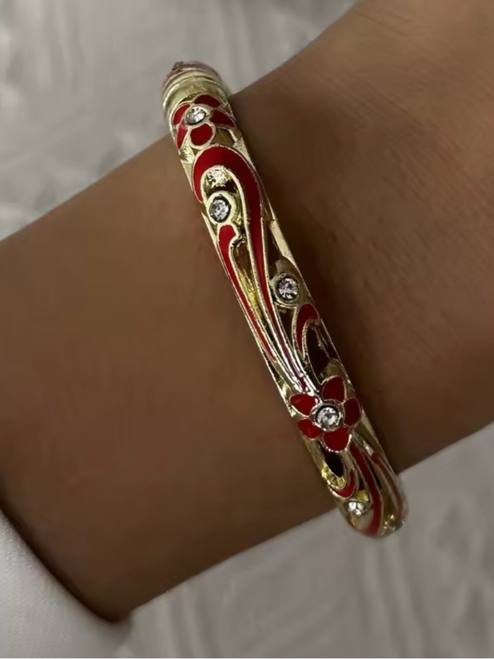Gold-Tone Red Enamel Floral Bangle Bracelet with Crystal Accents